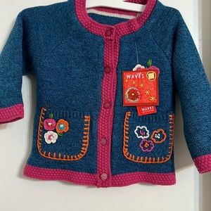 Waves girl’s reversible sweater.